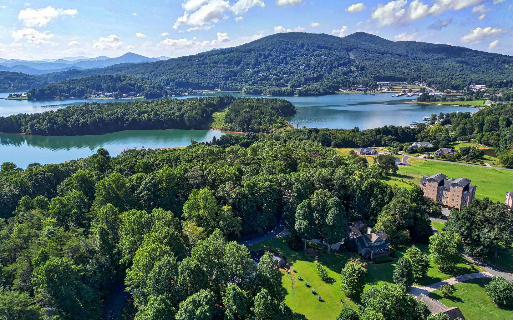 2255 Hy Top Road Young Harris, GA 30582 - Photo 54 of 65 an aerial view of a house with a garden and lake view