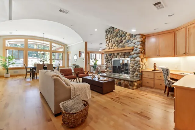 a kitchen with stainless steel appliances granite countertop a stove and a sink