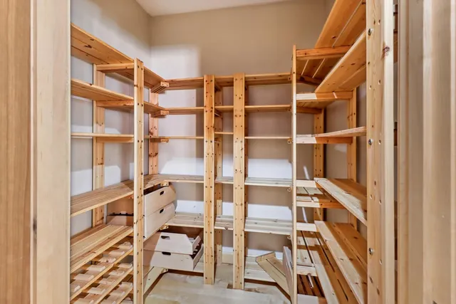 a bed room with a bed and a window