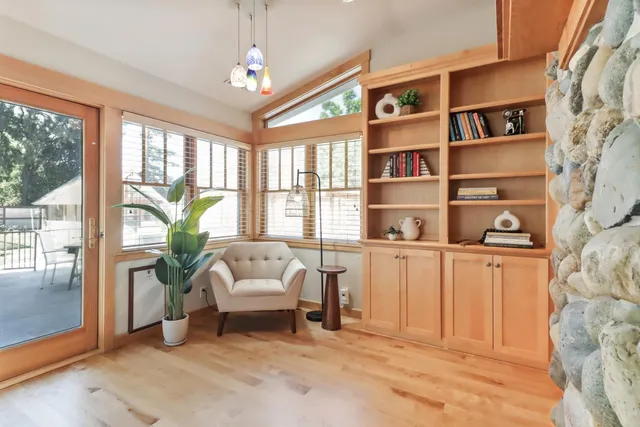 a bathroom with a shower and a sink