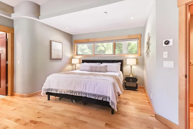 a view of a hallway with seating area