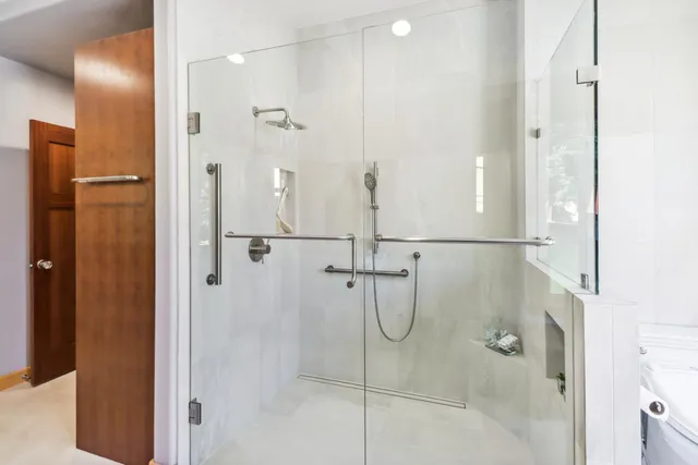 a view of a balcony with chairs