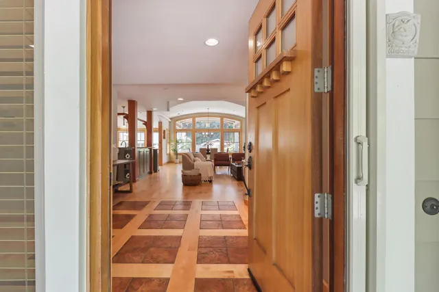 a kitchen with a stove a sink and a refrigerator
