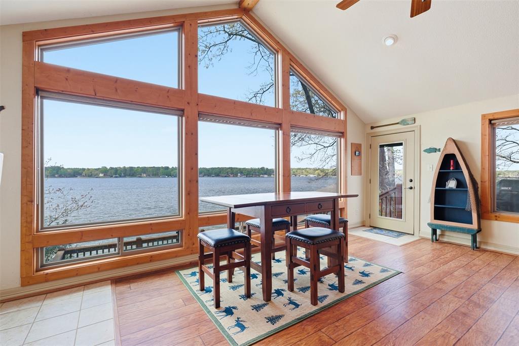 307 South Park Road Scroggins, TX 75480 - Photo 6 of 33 a view of a large room with furniture wooden floor and windows