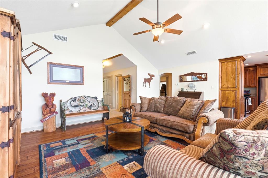 307 South Park Road Scroggins, TX 75480 - Photo 10 of 33 a living room with furniture ceiling fan and a rug