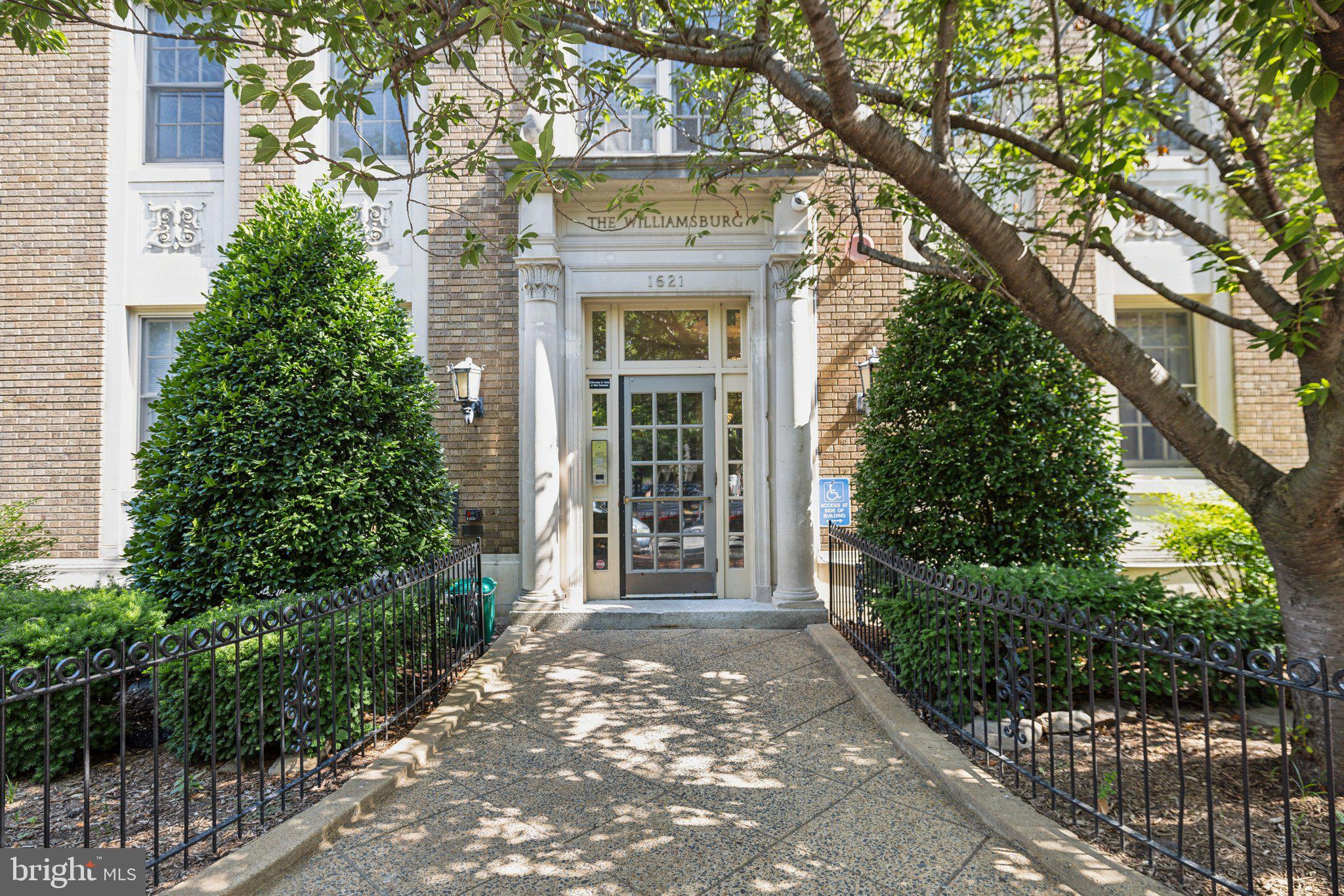 1621 T Street Northwest, Unit 307 Washington, DC 20009 - Photo 2 of 15 front view of a house with a tree