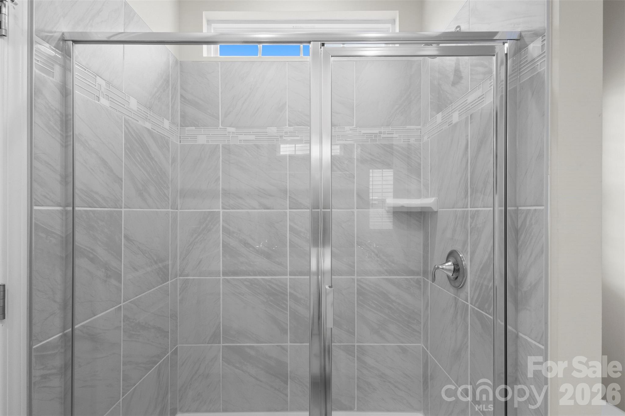 15224 Lake Ridge Road Charlotte, NC 28278 - Photo 18 of 32 a bathroom with a shower