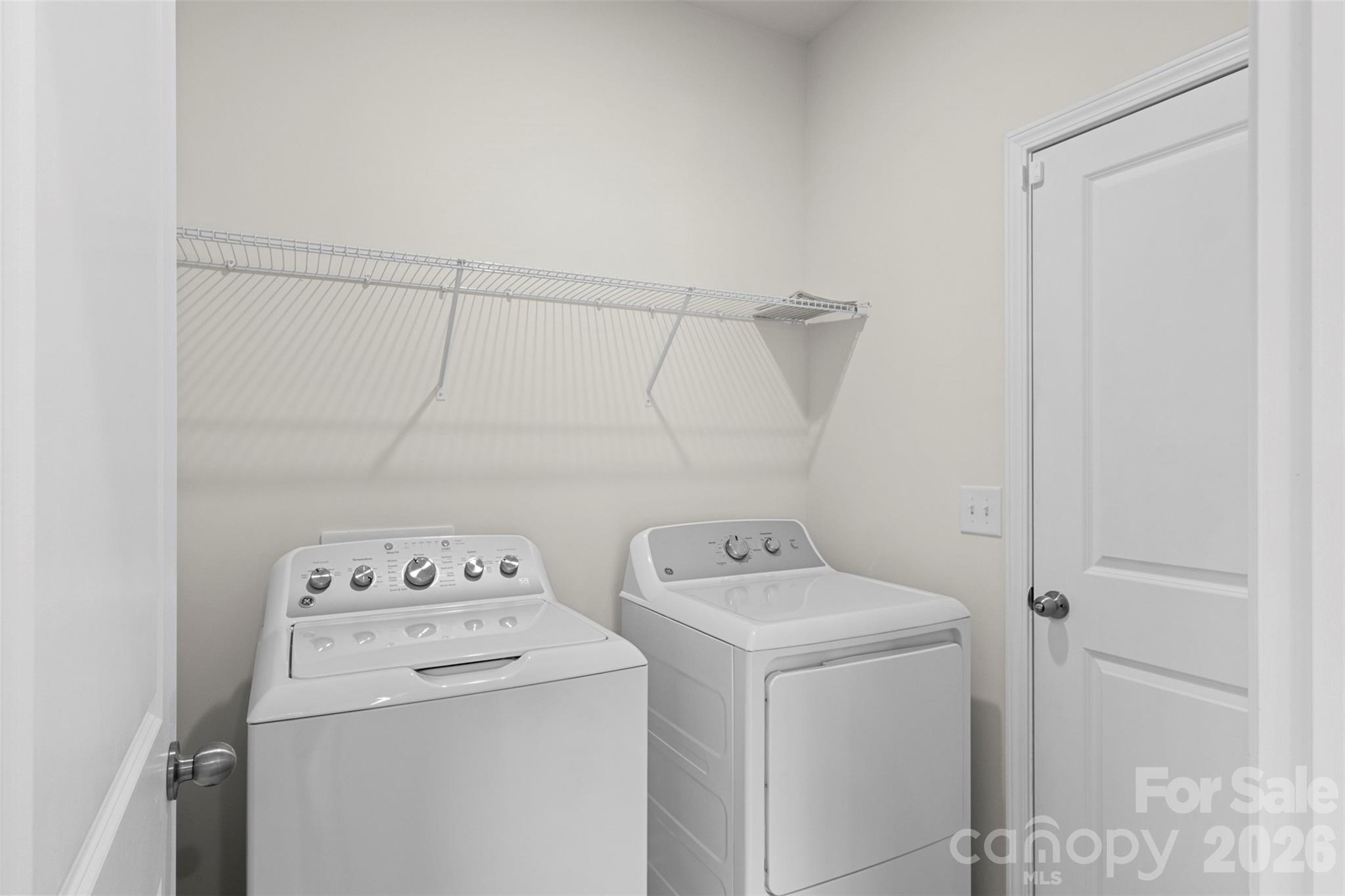 15224 Lake Ridge Road Charlotte, NC 28278 - Photo 20 of 32 a utility room with dryer and washer
