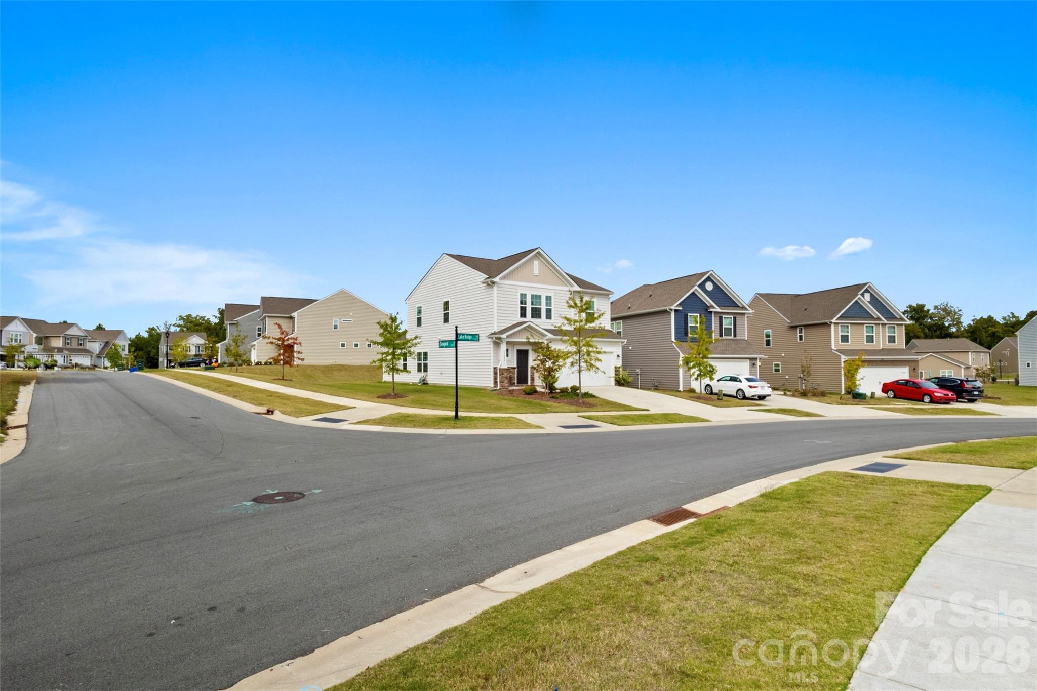 15224 Lake Ridge Road Charlotte, NC 28278 - Photo 2 of 32 a view of houses with outdoor space and lakeside