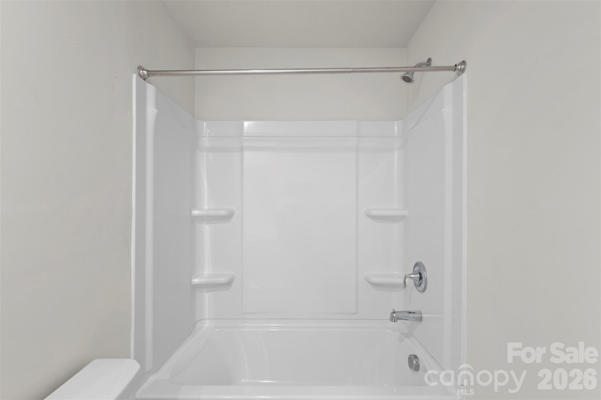 15224 Lake Ridge Road Charlotte, NC 28278 - Photo 26 of 32 a bathroom with a shower and a toilet