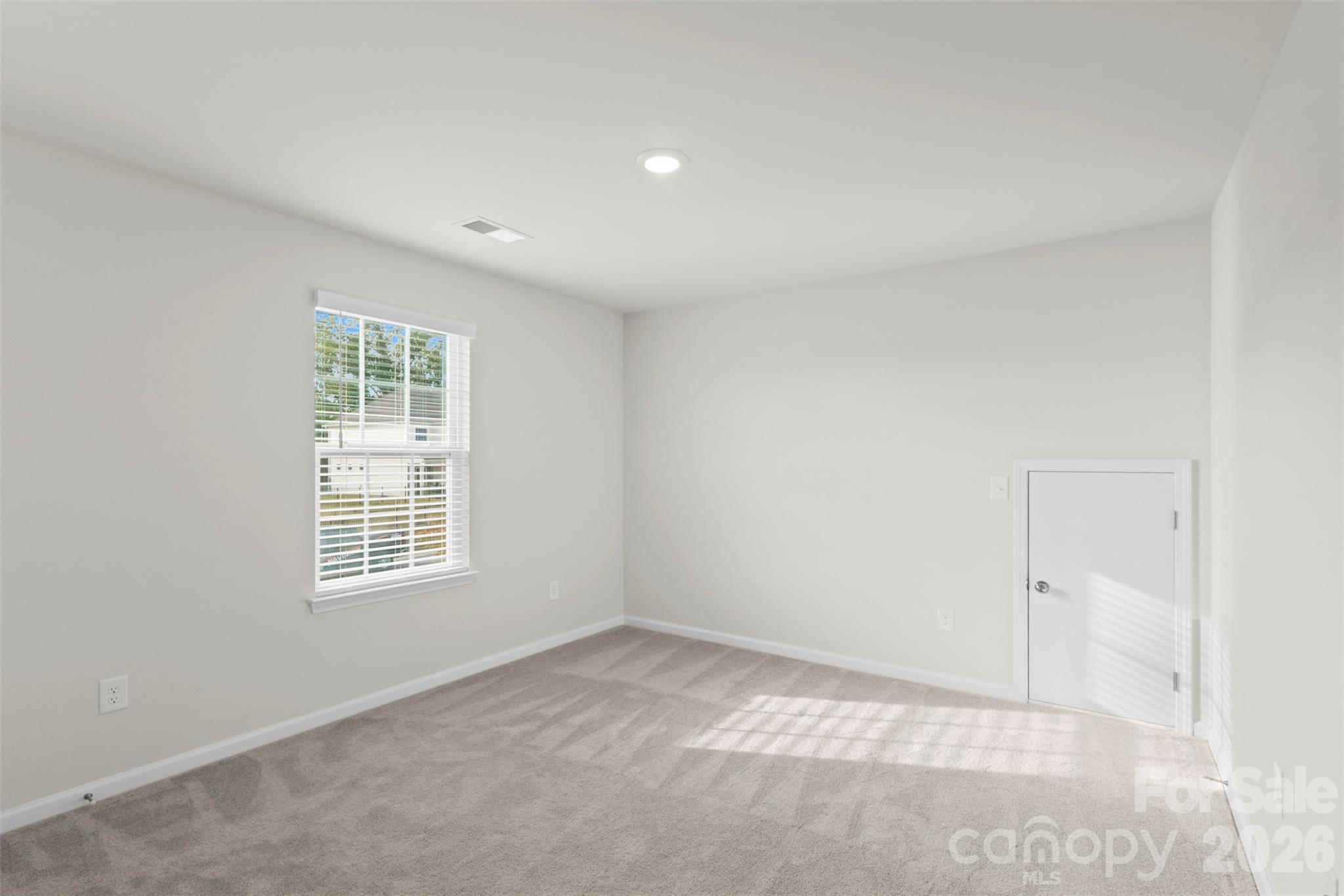 15224 Lake Ridge Road Charlotte, NC 28278 - Photo 27 of 32 an empty room with a window