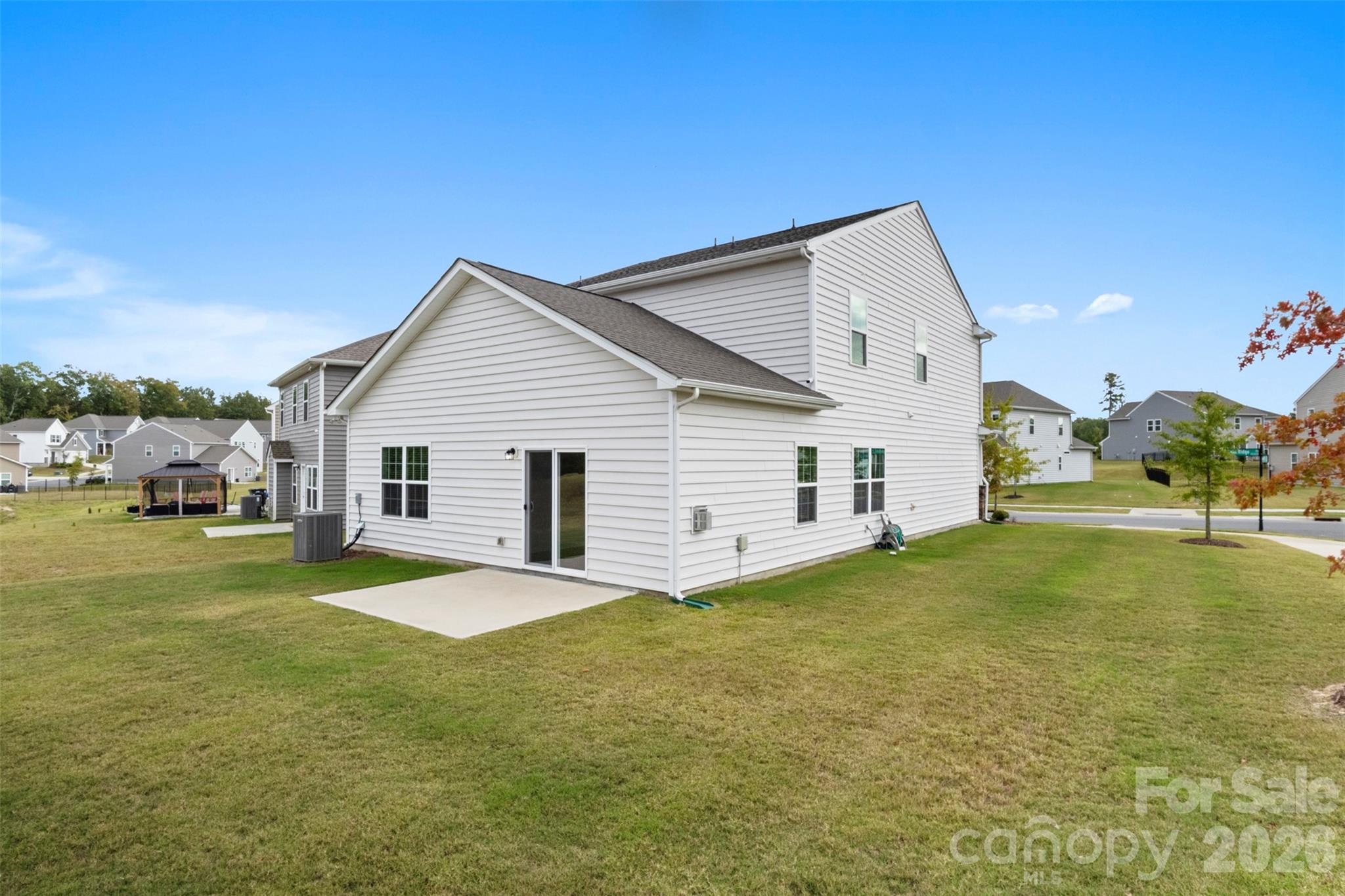 15224 Lake Ridge Road Charlotte, NC 28278 - Photo 30 of 32 a view of a house with a yard