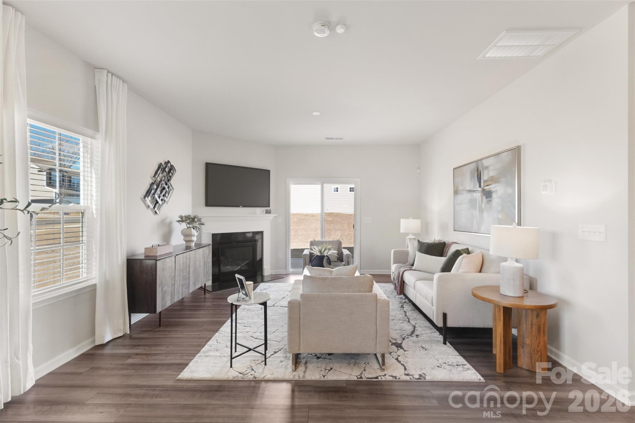 15224 Lake Ridge Road Charlotte, NC 28278 - Photo 5 of 32 a living room with fireplace furniture and a fireplace