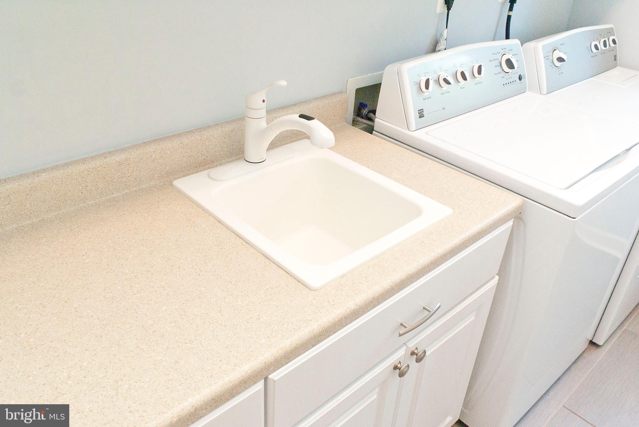 1005 Longbow Road Mount Airy, MD 21771 - Photo 21 of 43 1st Floor laundry w/ sink and storage