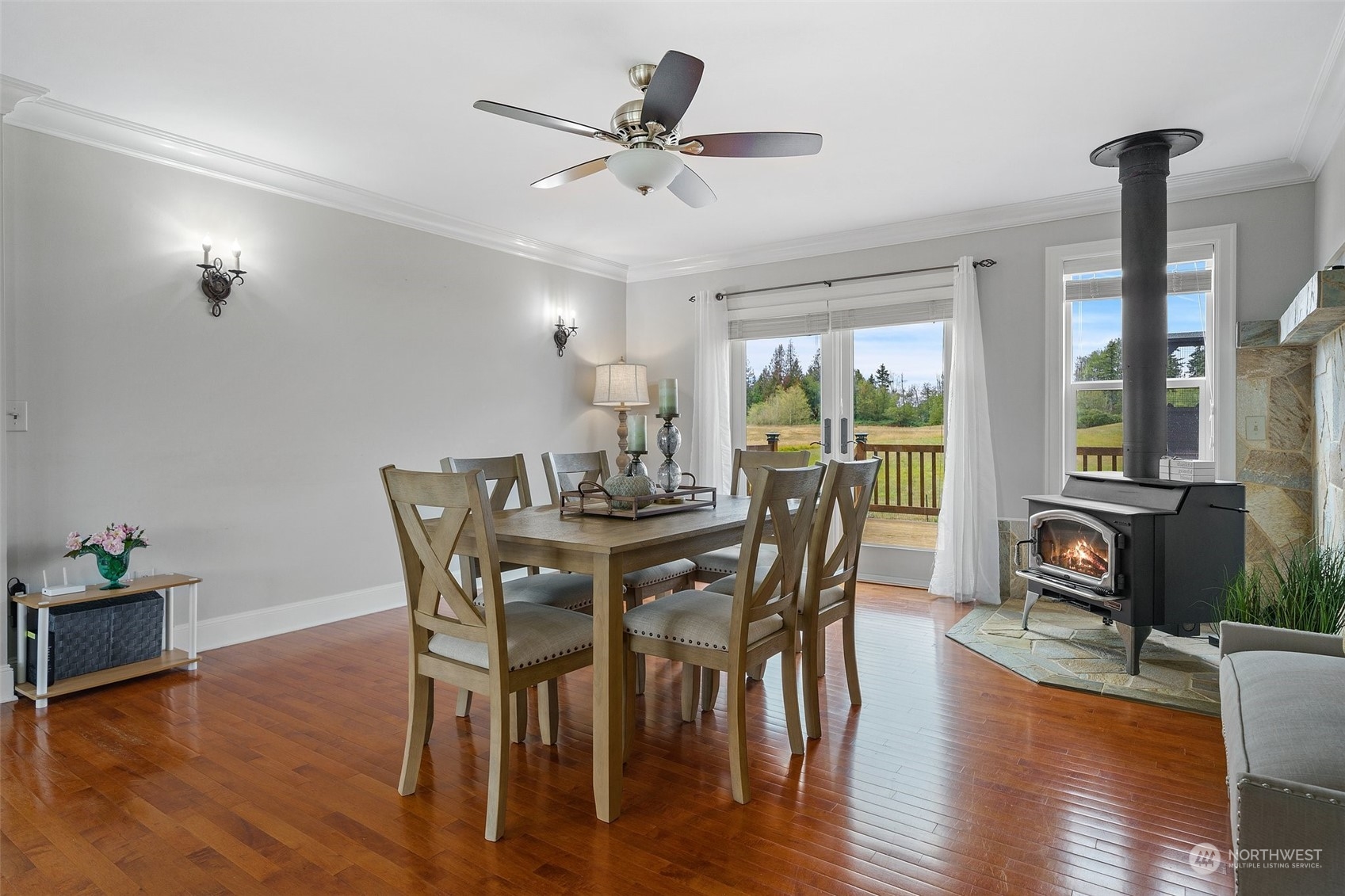 9435 Weidkamp Road Lynden, WA 98264 - Photo 16 of 40 a view of a dining room with furniture window and wooden floor