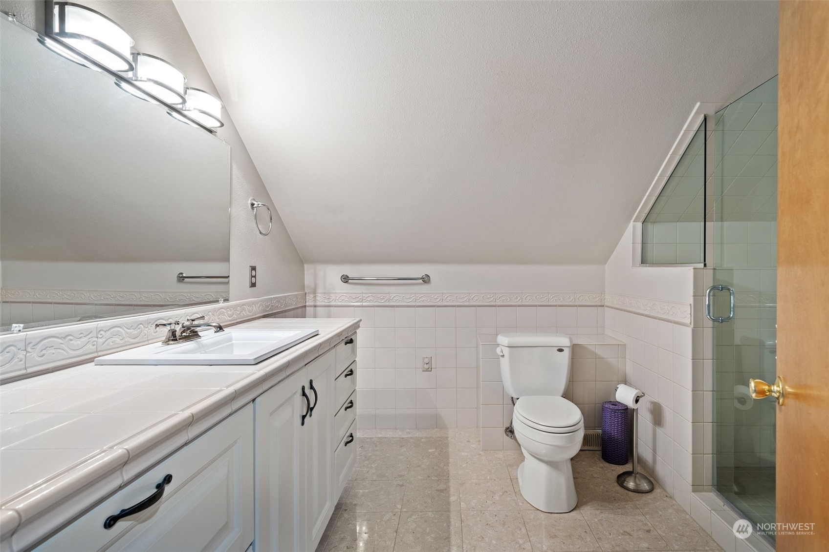 9435 Weidkamp Road Lynden, WA 98264 - Photo 22 of 40 a bathroom with a sink and mirror