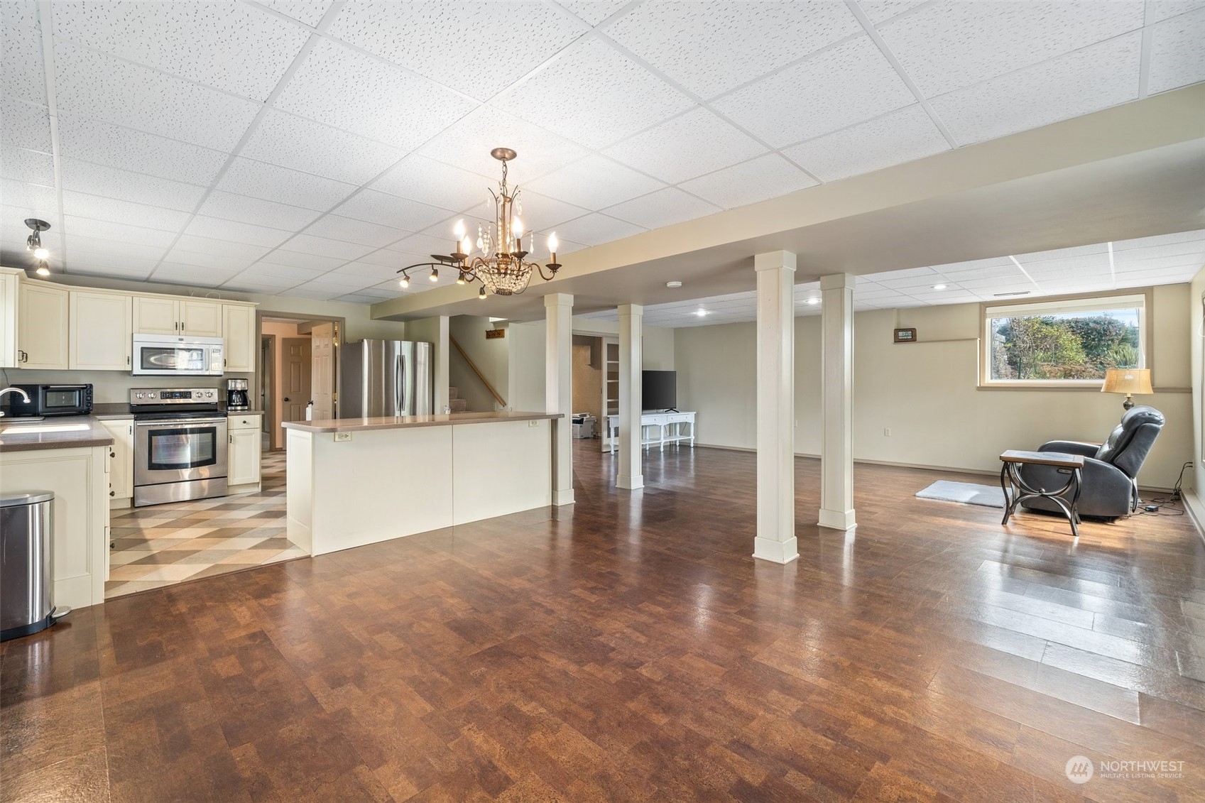 9435 Weidkamp Road Lynden, WA 98264 - Photo 26 of 40 a view of a kitchen with dining table chairs and refrigerator