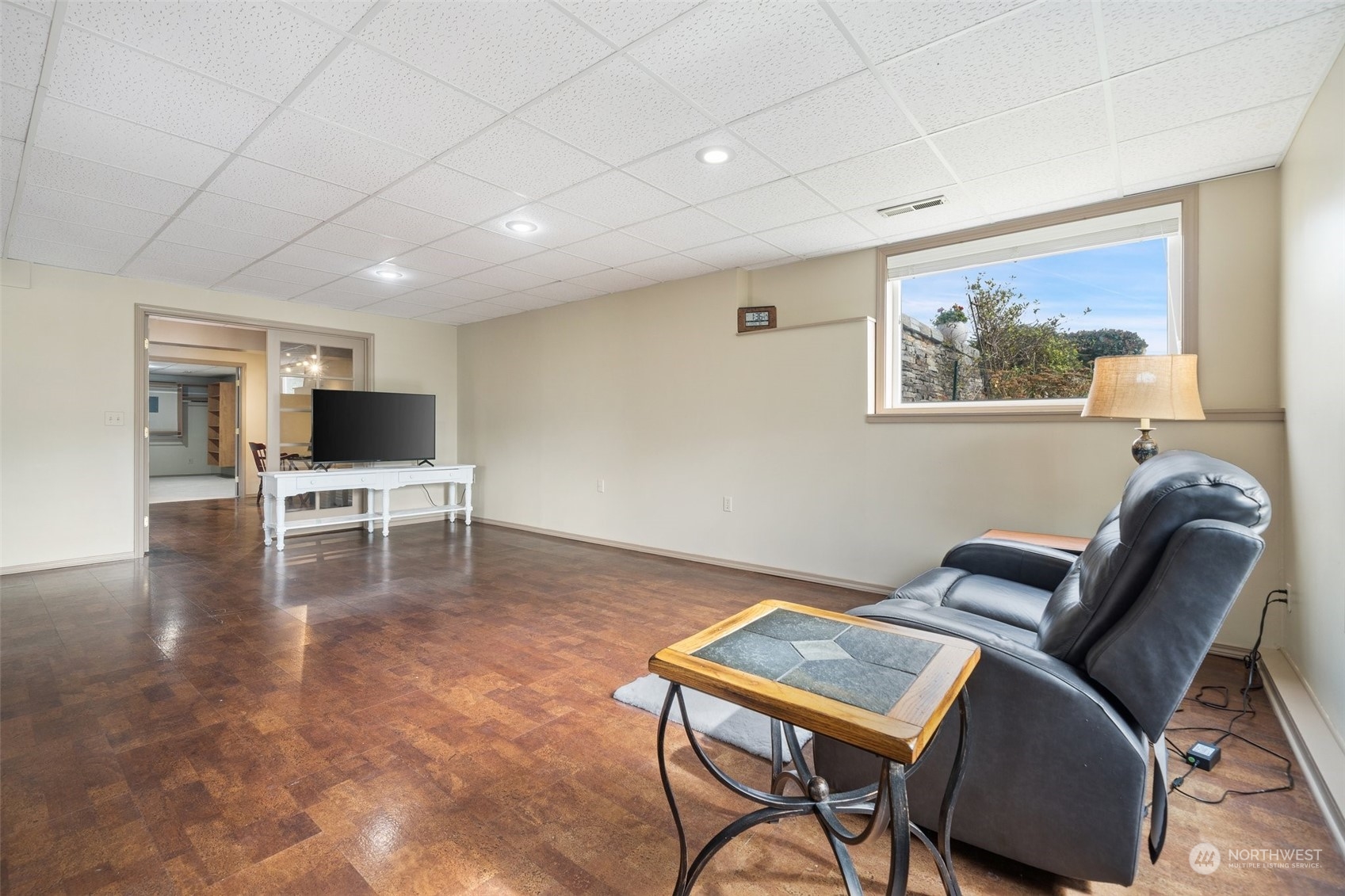 9435 Weidkamp Road Lynden, WA 98264 - Photo 27 of 40 a living room with furniture and a flat screen tv