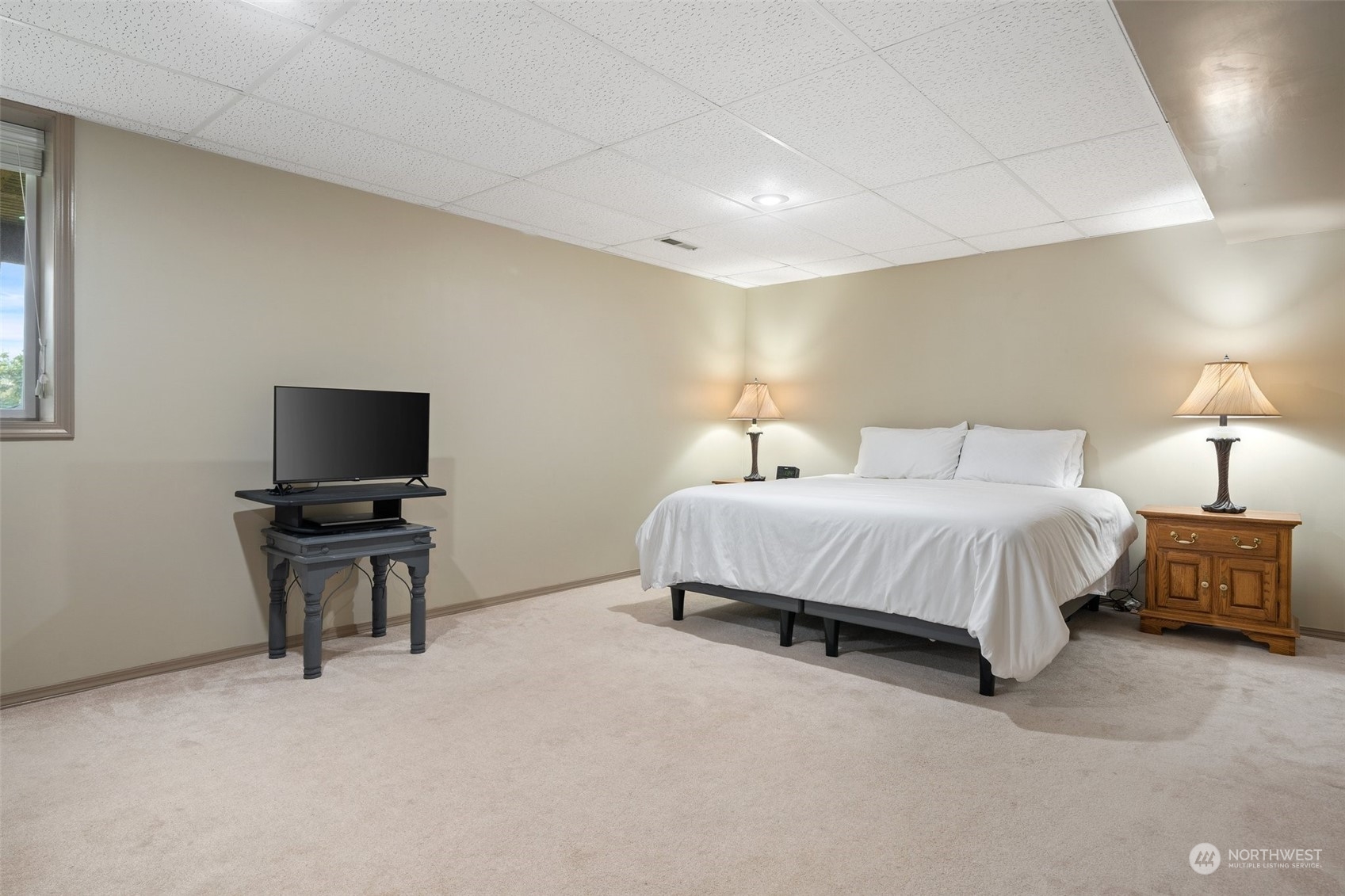 9435 Weidkamp Road Lynden, WA 98264 - Photo 28 of 40 a bedroom with a bed and a couch