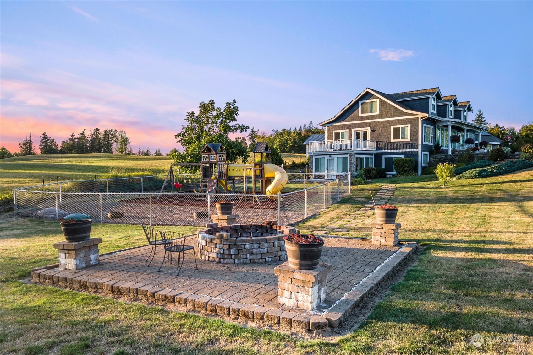 9435 Weidkamp Road Lynden, WA 98264 - Photo 32 of 40 a view of a house with swimming pool