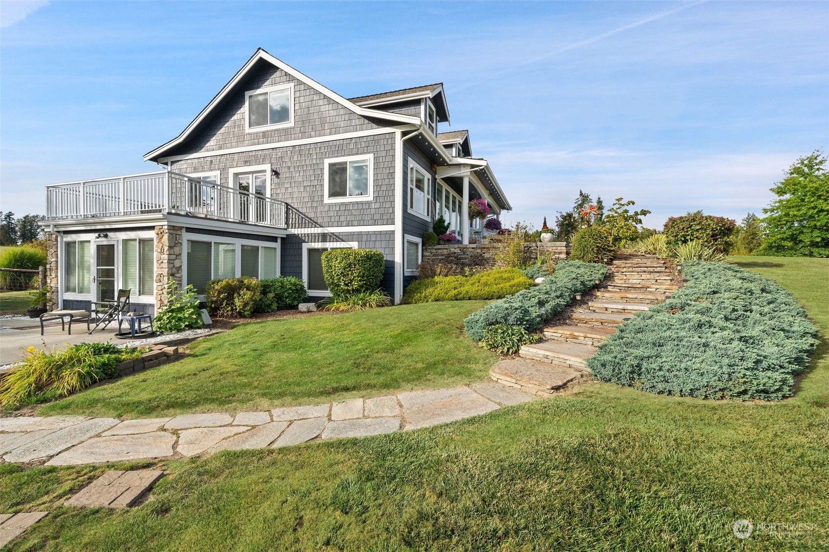 9435 Weidkamp Road Lynden, WA 98264 - Photo 33 of 40 a front view of a house with a yard