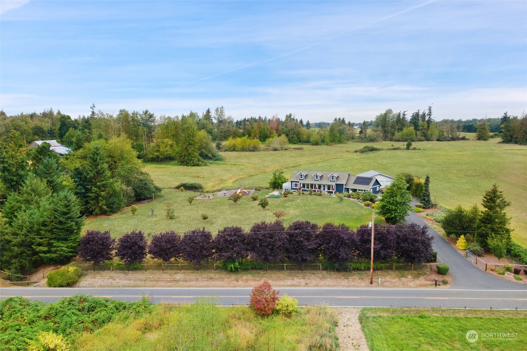 9435 Weidkamp Road Lynden, WA 98264 - Photo 37 of 40 a view of a lake with a big yard