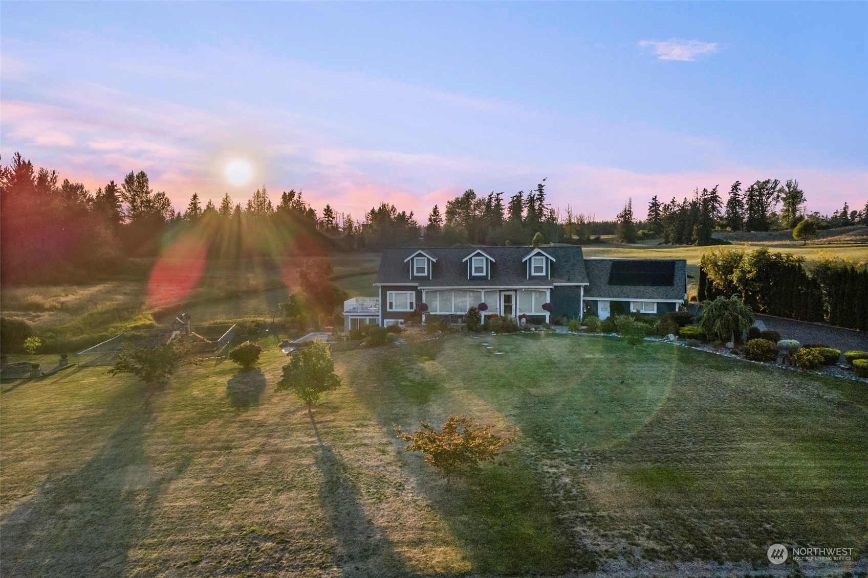 9435 Weidkamp Road Lynden, WA 98264 - Photo 39 of 40 a view of a lake with a city