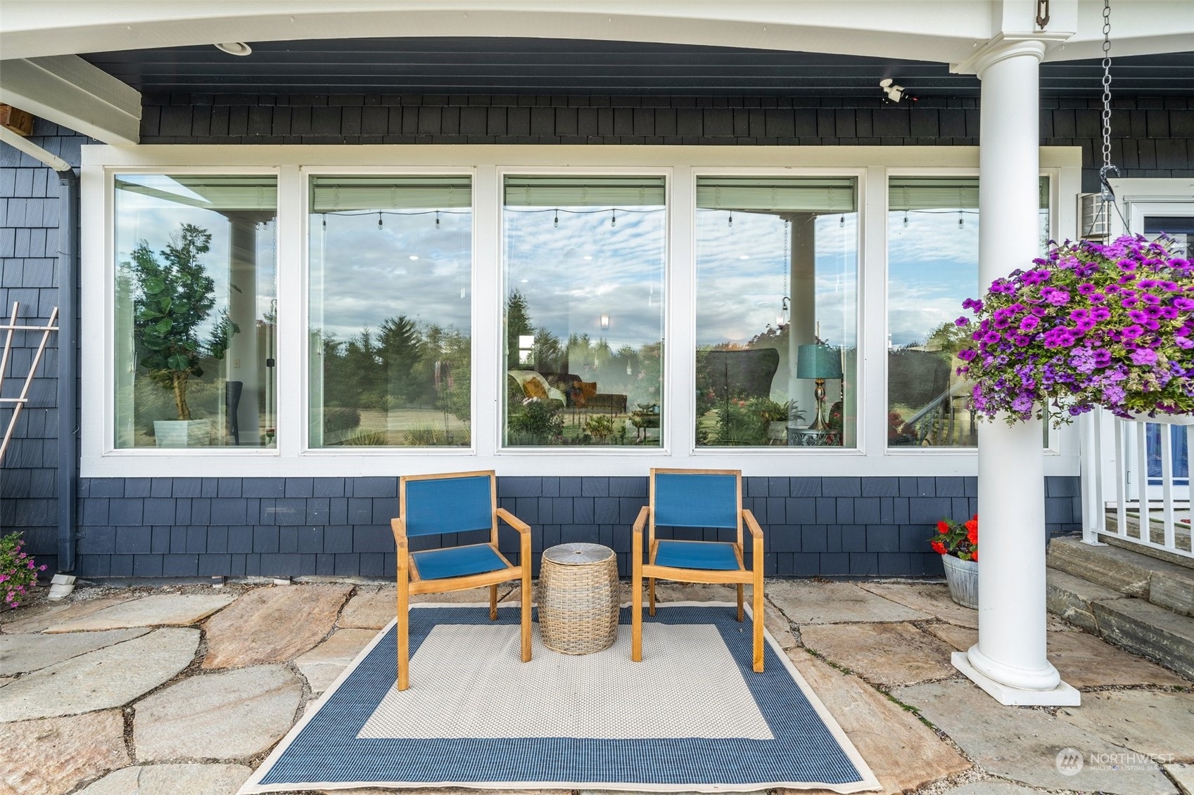 9435 Weidkamp Road Lynden, WA 98264 - Photo 4 of 40 a living room with a large window and table