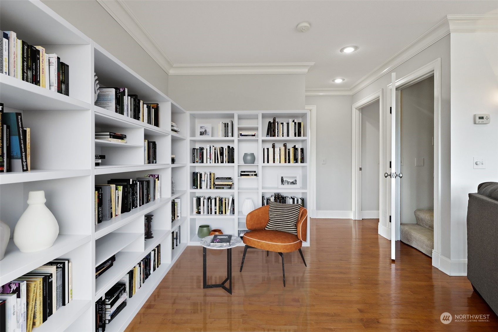 9435 Weidkamp Road Lynden, WA 98264 - Photo 10 of 40 a living room with furniture and a book shelf