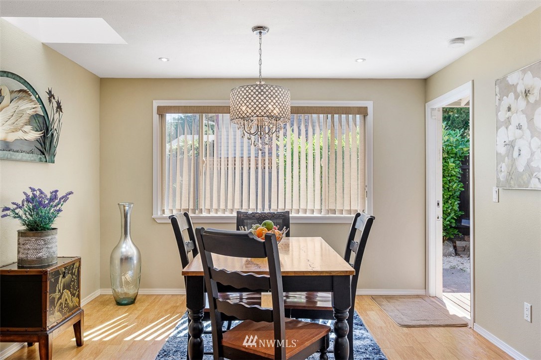 507 South 38th Court Renton, WA 98055 - Photo 11 of 40 a view of a dining room with furniture window and outside view
