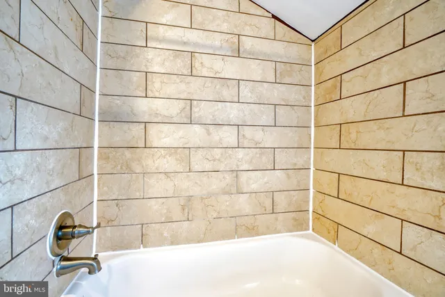 a bathroom with a sink and a shower