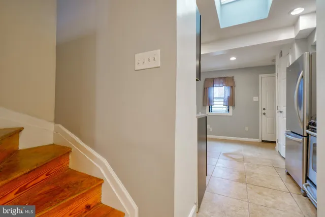 a view of entryway with bathroom