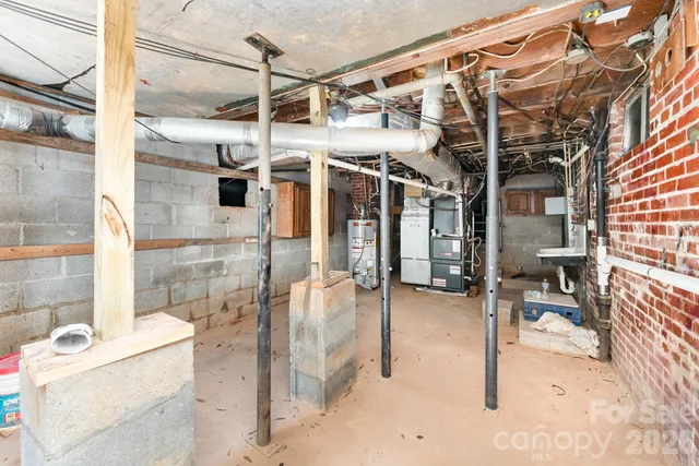 a view of a porch with a table and chairs
