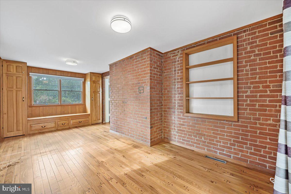 10101 Portland Road Silver Spring, MD 20901 - Photo 13 of 33 a view of an empty room and window