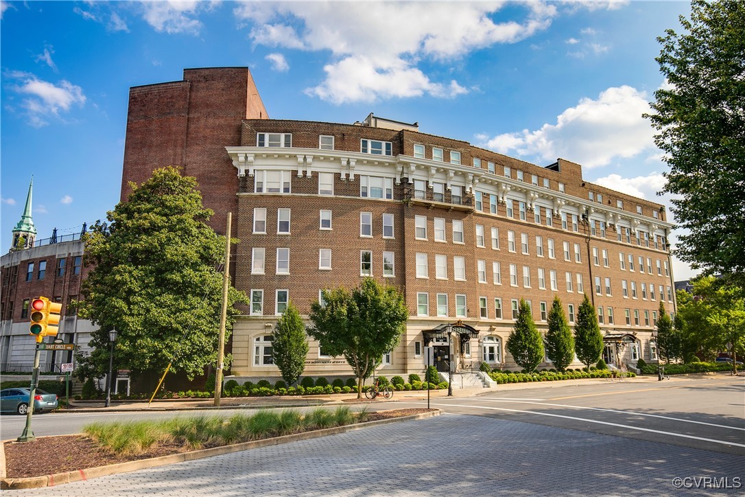 413 Stuart Circle, Unit 5E Richmond, VA 23220 - Photo 1 of 44 a tall building sitting on the side of a street