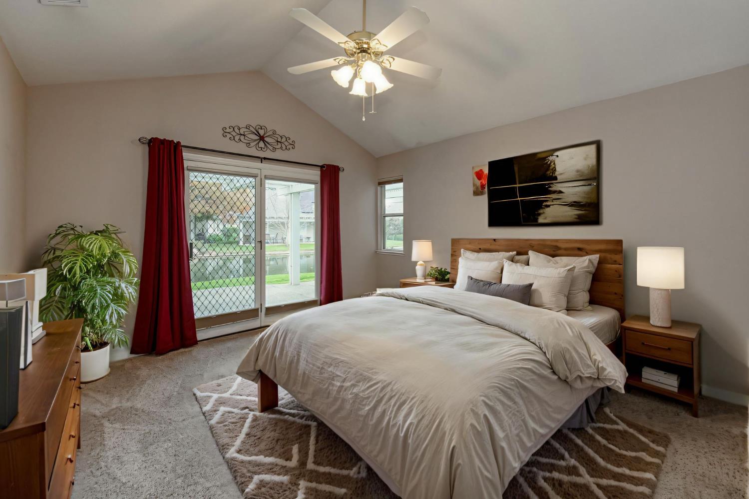 3014 West Brompton Lane Fresno, CA 93711 - Photo 35 of 71 Main bedroom w/slider to outside/backyard. Digitally furnished.