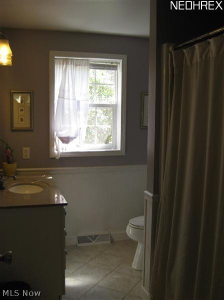5067 Rootstown Road Ravenna, OH 44266 - Photo 17 of 23 Full bath on first floor, ceramic flooring and newer fixtures!