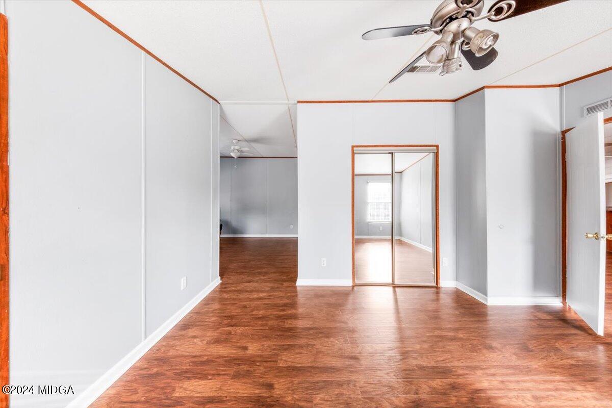 647 Gose Road Forsyth, GA 31029 - Photo 17 of 34 a view of a hallway with wooden floor