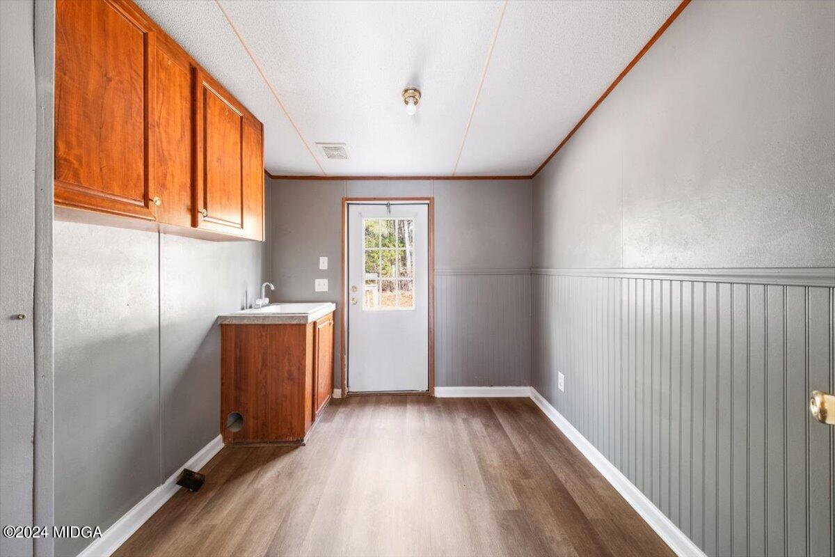 647 Gose Road Forsyth, GA 31029 - Photo 25 of 34 a view of kitchen with furniture and refrigerator