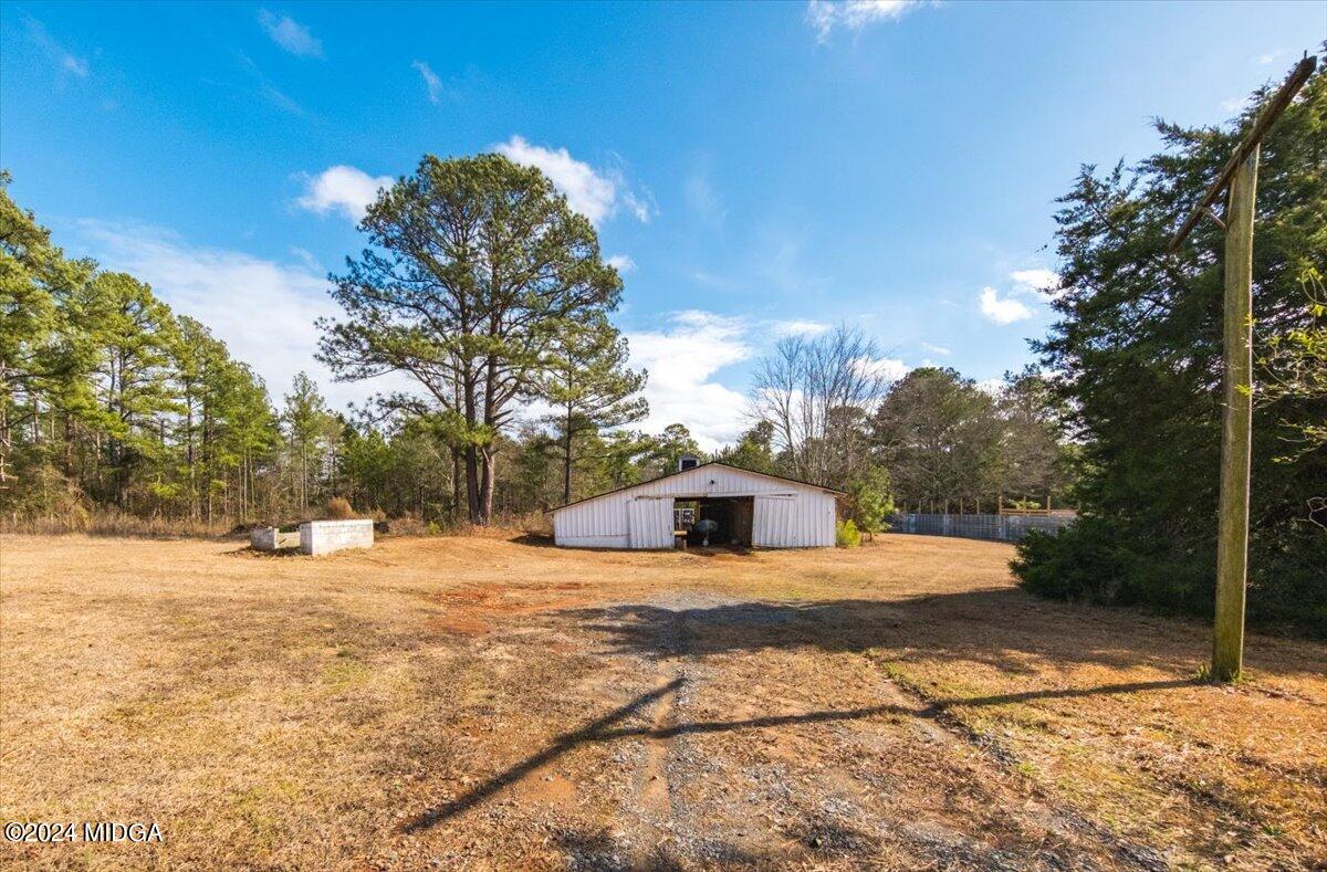 647 Gose Road Forsyth, GA 31029 - Photo 29 of 34 a view of a house with a yard