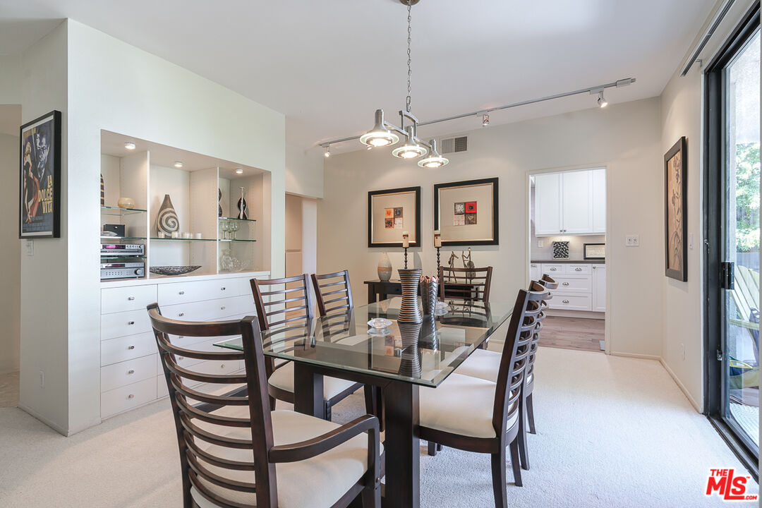 11322 Camarillo Street, Unit 201 Toluca Lake, CA 91602 - Photo 10 of 20 a view of a dining room and livingroom view