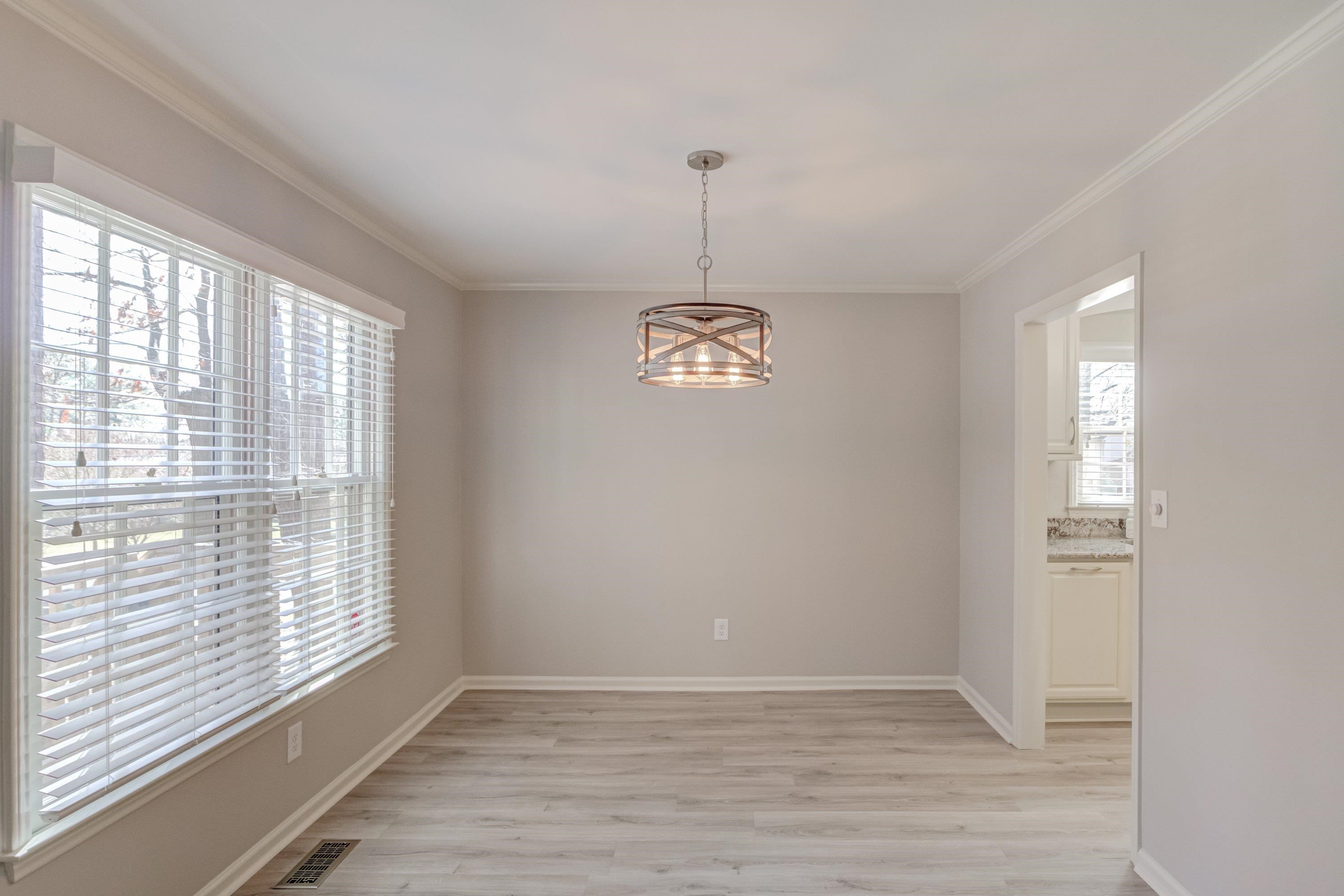 100 Wythe Circle Raleigh, NC 27615 - Photo 13 of 46 New Dining Room light