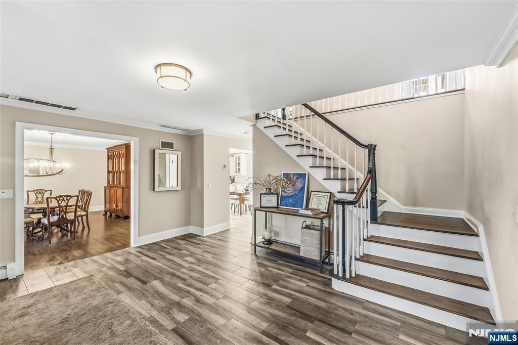 27 Pine Hill Road Old Tappan, NJ 07675 - Photo 6 of 50 a view of entryway and hall with wooden floor