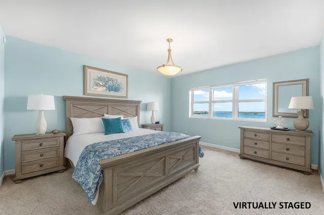 a view of an empty room with a chandelier