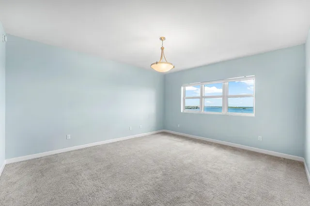 an empty room that has a window