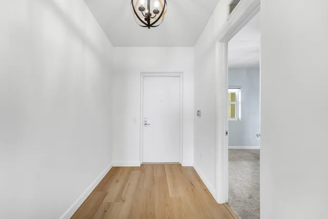 a view of swimming pool from a balcony