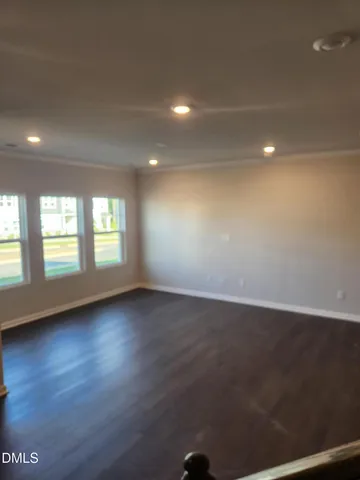 a bathroom with a double vanity sink and mirror
