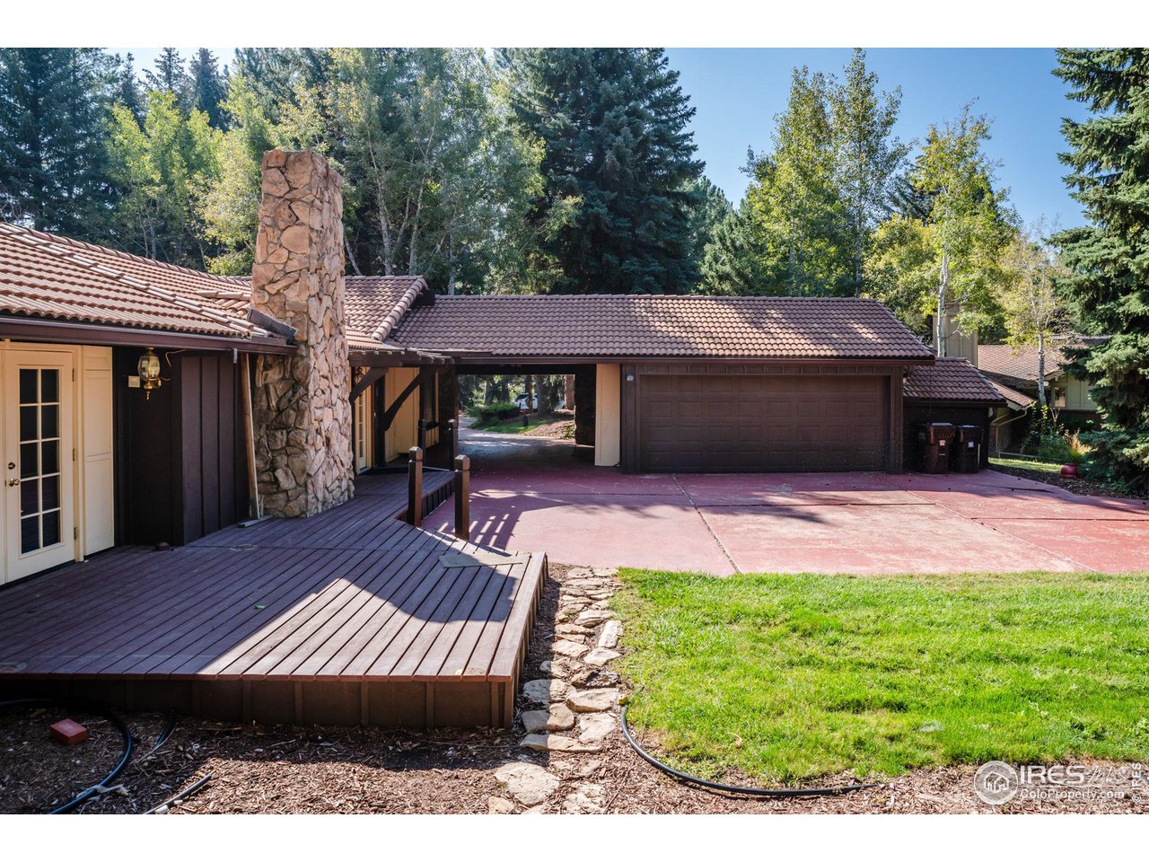 7125 Four Rivers Road Boulder, CO 80301 - Photo 38 of 40 a view of a wooden deck and yard