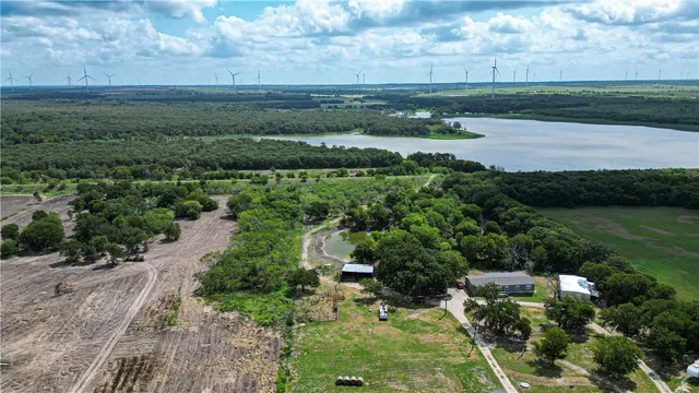 a view of a backyard with water fountain