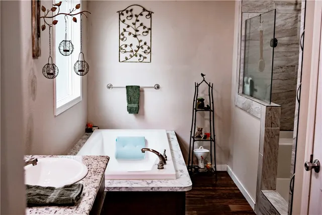 a living room with furniture a walk in closet and a window